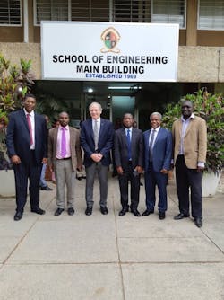 John McDonald with the IEEE leadership in Zamia outside the School of Engineering at the University of Zambia in Lusaka Zambia.