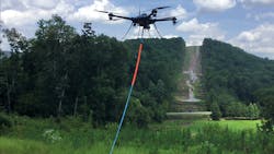 Alabama Power and Service Electric Co. partner to pull ropes across large valleys near Springville, Alabama. Alabama Power and Service Electric Co. partner to pull ropes across large valleys near Springville, Alabama.