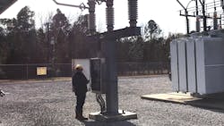 Brandon Lankford, WCEC power quality technician, performs an inspection on a circuit switcher. Brandon Lankford, WCEC power quality technician, performs an inspection on a circuit switcher.
