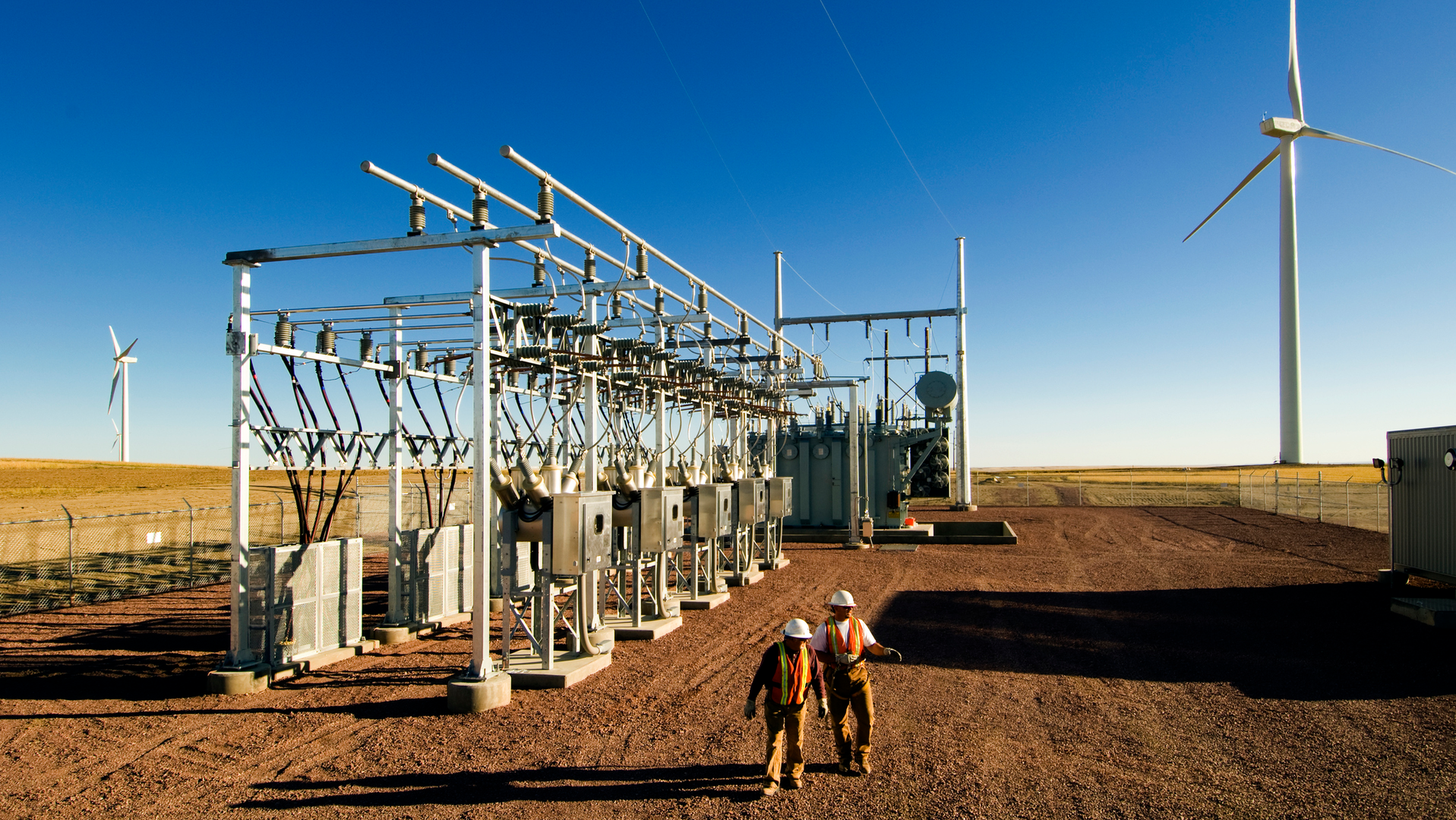 Workers By Substation Wind Turbine 5e4522344e313