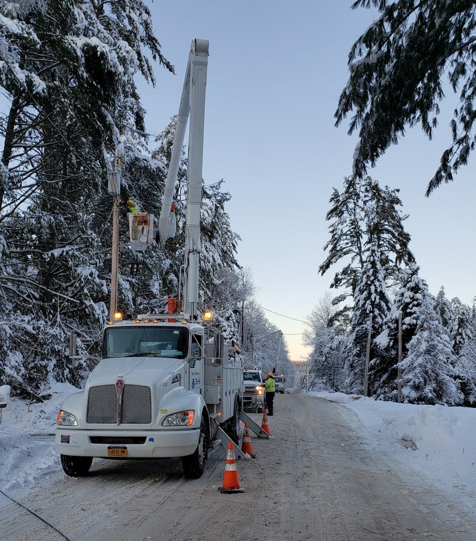 Crews worked in Thurman, New York, to replace a broken pole and damaged transformer due to heavy ice and snow conditions that brought down tree limbs and sagged pine trees onto the lines following Winter Storm Kade in February 2020.