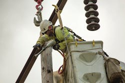 BPA line crews work to replace transmission components on a line north of Salem, Oregon. BPA line crews work to replace transmission components on a line north of Salem, Oregon.