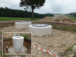 Completed tower foundations for composite pole.