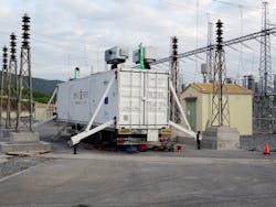 Mobile MPFC unit is parked inside substation and trailer outriggers are deployed. Two of the MPFC devices are partially elevated. Mobile MPFC unit is parked inside substation and trailer outriggers are deployed. Two of the MPFC devices are partially elevated.