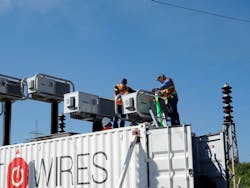 Each MPFC device is elevated to achieve electrical and safety clearances. Corona rings are attached and electrical connections between devices are completed. Each MPFC device is elevated to achieve electrical and safety clearances. Corona rings are attached and electrical connections between devices are completed.