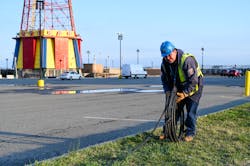 Con Edison’s emergency operations supervisor Al Marchione rolling out the cable that will be installed to feed the temporary shed to power Coney Island Hospital MCU Park Brooklyn. Con Edison’s emergency operations supervisor Al Marchione rolling out the cable that will be installed to feed the temporary shed to power Coney Island Hospital MCU Park Brooklyn.