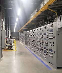 The building was designed to safely support the major equipment during normal operations and withstand system faults. The main switchboard control room is pictured here.