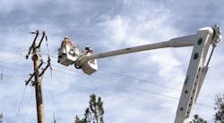 A BVES crew pulls the wire through on the job. A BVES crew pulls the wire through on the job.