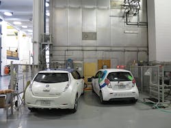 Electric vehicles Chevrolet Spark (right) from General Motors and Leaf (left) from Nissan.