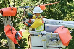 Penn Power lineworker Alex Greathouse installs an automated reclosing device on a single-phase power line in western Pennsylvania. Penn Power lineworker Alex Greathouse installs an automated reclosing device on a single-phase power line in western Pennsylvania.