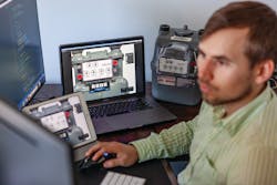 A developer works on an app that helps teach apprentices how to quickly and easily read gas meters. A developer works on an app that helps teach apprentices how to quickly and easily read gas meters.