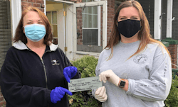 Brinnah Leiching, Communications Coordinator at L.I.N.E., gives the check to Marilyn Richardson of the Saugerties Food Pantry on May 12, 2020. Brinnah Leiching, Communications Coordinator at L.I.N.E., gives the check to Marilyn Richardson of the Saugerties Food Pantry on May 12, 2020.