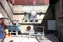 A prototype nonconductive foil balloon is positioned for testing using the most advanced balloon raising test rig at PG&E's Applied Technology Services facility. The new balloons survived five minutes within conductors at 21 kV phase-to-phase without causing a fault. A prototype nonconductive foil balloon is positioned for testing using the most advanced balloon raising test rig at PG&E's Applied Technology Services facility. The new balloons survived five minutes within conductors at 21 kV phase-to-phase without causing a fault.