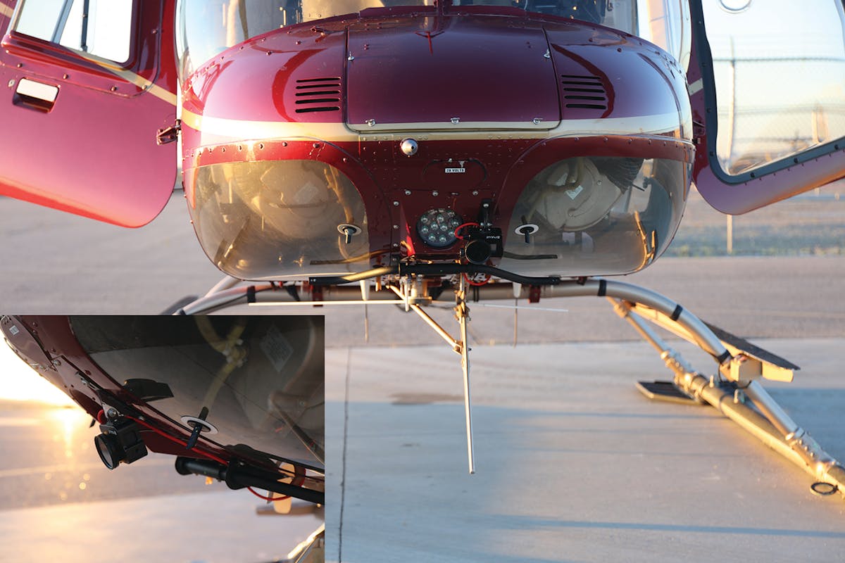 A GoPro camera is mounted on T-Lines using an aerial inspection helicopter.