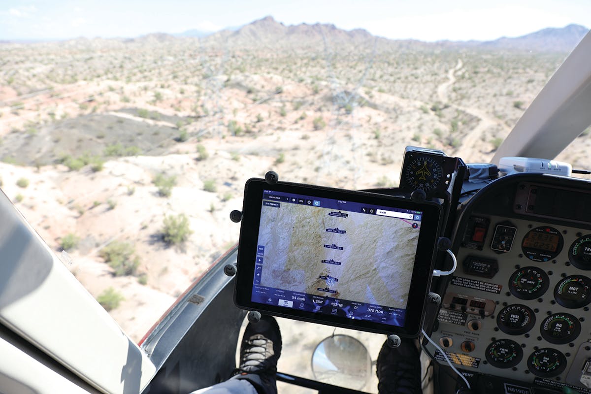 GPS-tracking GIS software tracks T-Lines during an aerial inspection helicopter flight.