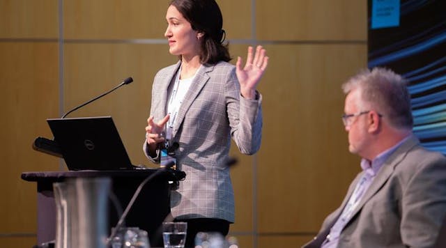 Elaine Meshki speaks at an event