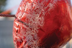 Metallic balloons contacting power lines typically result in an intense arc flash. With a resonant grounded isolation transformer the ground fault energy was reduced to the point that balloons often don’t even pop. Metallic balloons contacting power lines typically result in an intense arc flash. With a resonant grounded isolation transformer the ground fault energy was reduced to the point that balloons often don’t even pop.