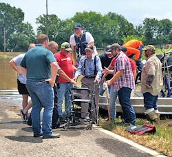 Entergy&apos;s employees assisted a customer using an airboat following a flood.