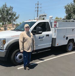 As a troubleshooter for Salt River Project, Henry Hansen is able to take his work truck home so he can respond to outage calls and emergencies in his region.