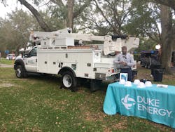 Troubleman Ken Coleman volunteers at a City of Windermere event to engage with the local community near his operations center near Orlando and meet customers.