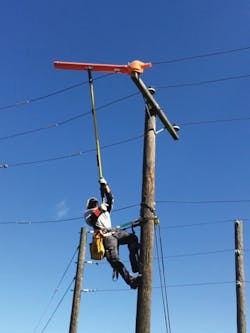 Troubleman Ken Coleman works at the Duke Energy Winter Garden Training Center applying a hard insulator. Troubleman Ken Coleman works at the Duke Energy Winter Garden Training Center applying a hard insulator.