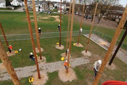 Students of FirstEnergy’s Power Systems Institute program climb 40-ft poles during a training session at Jersey Central Power and Light’s service center in Phillipsburg, New Jersey. Students of FirstEnergy’s Power Systems Institute program climb 40-ft poles during a training session at Jersey Central Power and Light’s service center in Phillipsburg, New Jersey.
