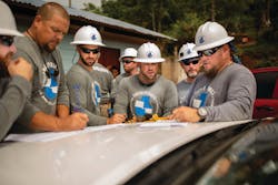 Linemen representing 17 electric cooperatives from Oklahoma and Colorado collaborated to electrify the village of Sillab. Linemen representing 17 electric cooperatives from Oklahoma and Colorado collaborated to electrify the village of Sillab.