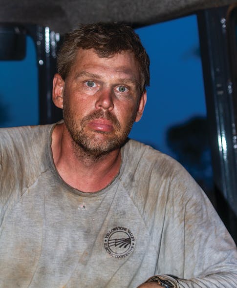 Teter&rsquo;s face shows the effects of working a 14-hour day in the Bolivian heat and humidity.