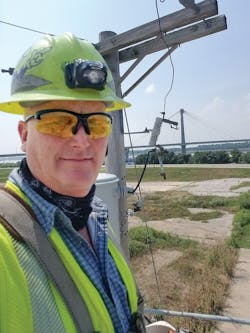 Scott Walsh&rsquo;s selfie shows the cable-stayed Clark Bridge in the background. The Clark Bridge spans across the Mississippi River between West Alton, Missouri, and Alton, Illinois.