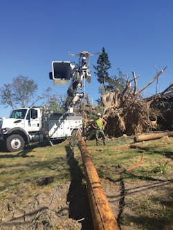 Many safety professionals were on the ground throughout the restoration to support crew and community safety and take photos such as this one. Many safety professionals were on the ground throughout the restoration to support crew and community safety and take photos such as this one.