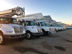 Trucks at sunrise: Crews from across the country and Canada arrived to help in the restoration. Trucks at sunrise: Crews from across the country and Canada arrived to help in the restoration.