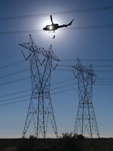 SRP line workers are lowered onto energized towers by helicopter and climb down 150 ft to ground while inspecting for defects and damage.