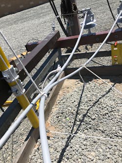 Phase-to-phase contact with covered conductor, energized at 12 kV. Current was measured at 0.008 mA. Phase-to-phase contact with covered conductor, energized at 12 kV. Current was measured at 0.008 mA.