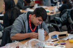 3. A participant from ComEd’s Create a Spark Program works on project, depicted here when student STEM participants were able to meet in person to collaborate on innovative ideas and concepts. This program has moved to virtual space in 2020, giving students the opportunity to connect with ComEd engineers and develop projects from the comfort and safety of home. 3. A participant from ComEd’s Create a Spark Program works on project, depicted here when student STEM participants were able to meet in person to collaborate on innovative ideas and concepts. This program has moved to virtual space in 2020, giving students the opportunity to connect with ComEd engineers and develop projects from the comfort and safety of home.