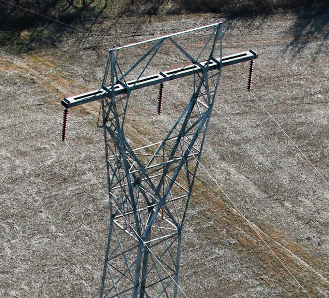Aerial photo of the lattice tower with crossarm in bending.