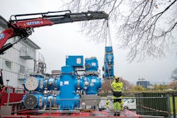 Blue GIS being lifted to third floor of substation K. Blue GIS being lifted to third floor of substation K.
