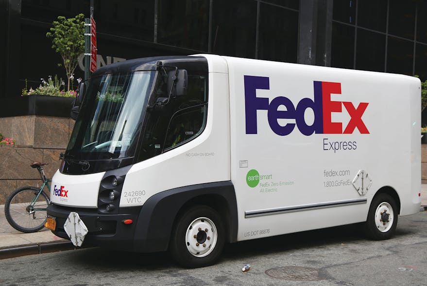 A FedEx all-electric truck in Lower Manhattan. The delivery company added Nissan e-NV200 vans to its delivery fleet in 2014 as a part of its EarthSmart program.