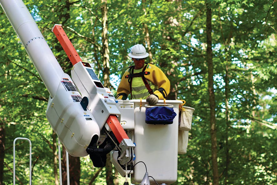 Eversource crews work to restore power in Amherst, New Hampshire, on Aug. 6 following Isaias.
