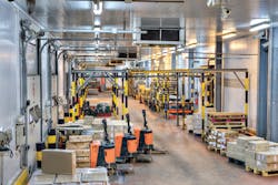 Workers in a warehouse in St. Petersburg, Russia. Most warehouses use relatively small amounts of electricity but charging trucks at warehouses could change all that. Workers in a warehouse in St. Petersburg, Russia. Most warehouses use relatively small amounts of electricity but charging trucks at warehouses could change all that.