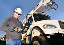 Ryan Corey, a line foreman at Umatilla Electric Cooperative, uses the Esri Survey123 application on an iPad to report on an outage. Ryan Corey, a line foreman at Umatilla Electric Cooperative, uses the Esri Survey123 application on an iPad to report on an outage.