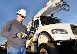 Ryan Corey, a line foreman at Umatilla Electric Cooperative, uses the Esri Survey123 application on an iPad to report on an outage. Ryan Corey, a line foreman at Umatilla Electric Cooperative, uses the Esri Survey123 application on an iPad to report on an outage.