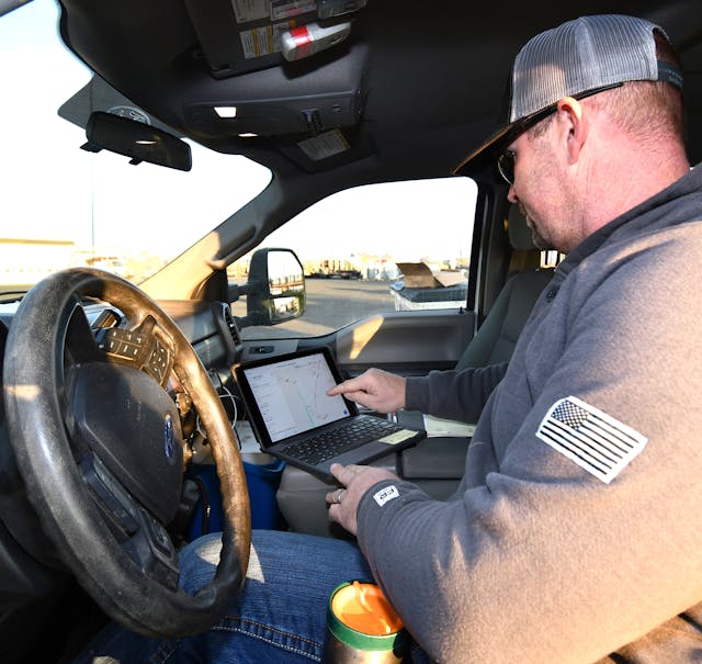 Ryan Corey, a line foreman at Umatilla Electric Cooperative, uses the Esri ArcGIS Collector application on an iPad to view the UEC Field Map.