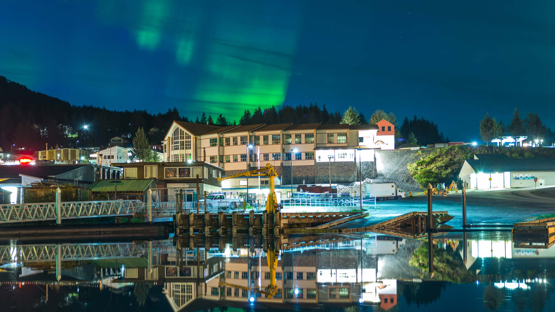 The aurora borealis appears over Cordova's town center. About 2,300 people live in the town year-round.