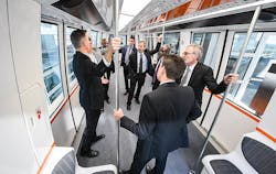 On Nov. 27, 2018, executives from NREL, Oak Ridge National Laboratory, and Dallas-Fort Worth International Airport tour DFW facilities via the Skylink. The group is working on a three-year research project to identify new transportation technologies that could dramatically improve energy use, convenience and affordability. The Advancing Transportation Hub Efficiency using Novel Analytics (ATHENA) system uses high-performance computing to simulate and accurately model the movement and energy flow of passengers and freight in airports and connected areas. On Nov. 27, 2018, executives from NREL, Oak Ridge National Laboratory, and Dallas-Fort Worth International Airport tour DFW facilities via the Skylink. The group is working on a three-year research project to identify new transportation technologies that could dramatically improve energy use, convenience and affordability. The Advancing Transportation Hub Efficiency using Novel Analytics (ATHENA) system uses high-performance computing to simulate and accurately model the movement and energy flow of passengers and freight in airports and connected areas.