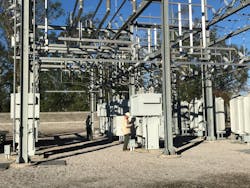 Riviera team members Stephen Adams and Wayne Gideons using eSMART technology to record the readings of relays inside the substation. Riviera team members Stephen Adams and Wayne Gideons using eSMART technology to record the readings of relays inside the substation.