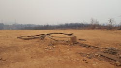 This twisted steel and concrete footing was part of a steel lattice tower incinerated during the “firenado” that laid waste to WAPA structures near the Keswick Dam area during the Carr Fire. This twisted steel and concrete footing was part of a steel lattice tower incinerated during the “firenado” that laid waste to WAPA structures near the Keswick Dam area during the Carr Fire.