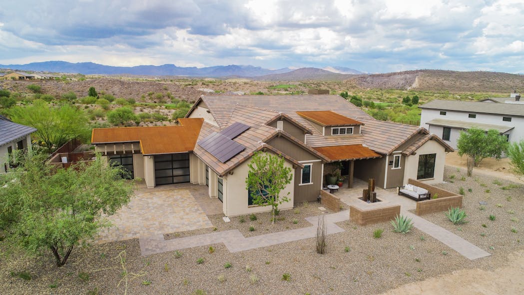 A house at Mandalay Homes&rsquo; Jasper planned community in Prescott Valley, Arizona. The homes use green building technology and the project includes a 23 MWh networked energy storage system to store solar power.