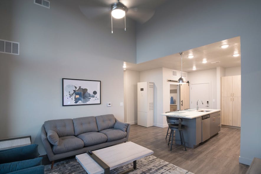 Soleil Loft apartment interior. These homes will generate their own power from rooftop solar systems and store any not used immediately in-home battery units.