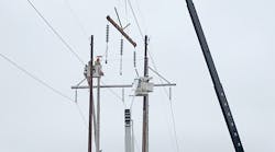 Using the barehand method, Three Phase Line Construction crews have set two new steel poles. They are also working to install a steel cross arm for one of the new H-frame structures on Eversource&apos;s 1465 Line in Connecticut.