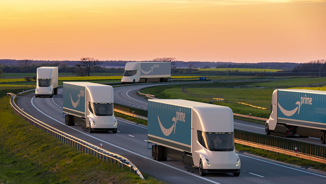 A fleet of Amazon-branded electric trucks.